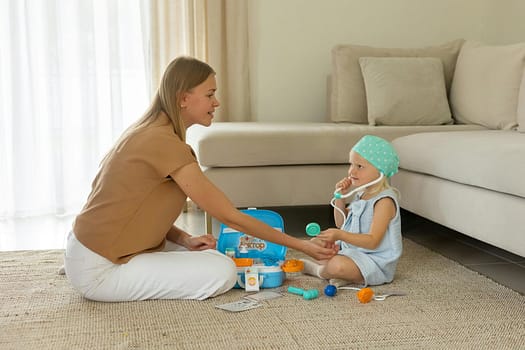 Caregiver playing with child